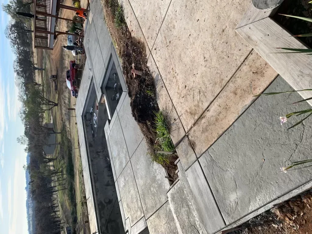 New concrete driveway with control joints and finished surface